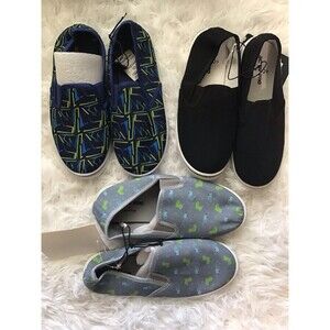 3 Pairs of boys slip on sneakers. Size Small. New with tags.
